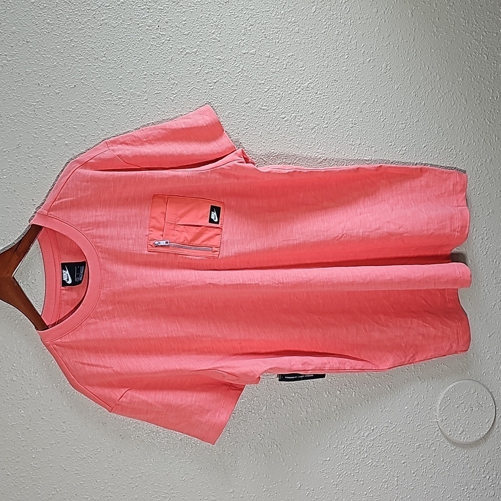 Nike Zip Pocket T-Shirt.